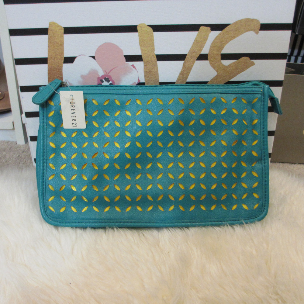 No Longer Available!!!





Clutch Teal Green & Yellow New! 3 for $20